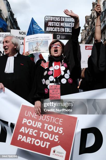 Lawyers take part in a demonstration as part of a nationwide action day by magistrates against a draft law to reform the French justice system in...