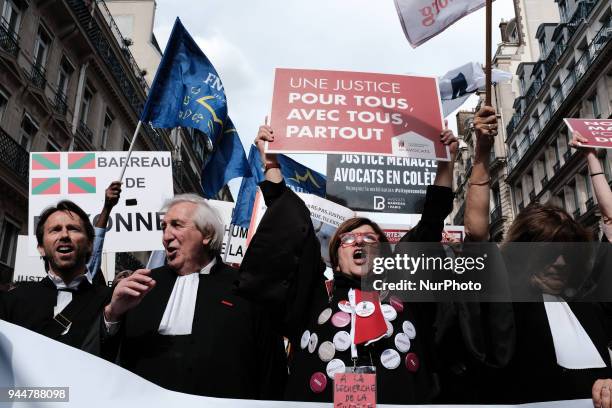 Lawyers take part in a demonstration as part of a nationwide action day by magistrates against a draft law to reform the French justice system in...