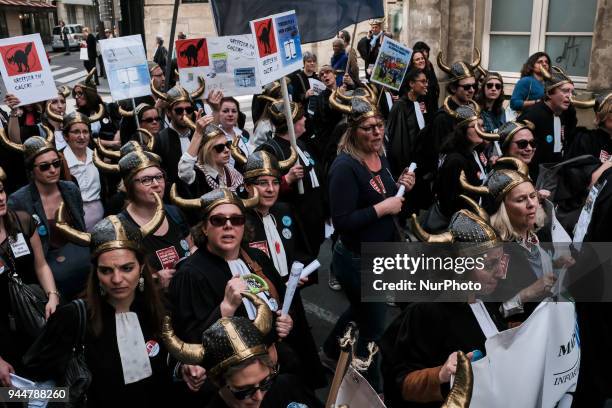 Lawyers take part in a demonstration as part of a nationwide action day by magistrates against a draft law to reform the French justice system in...