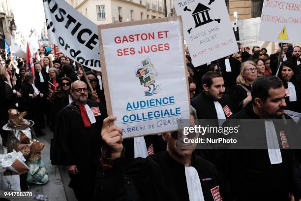 Lawyers take part in a demonstration as part of a nationwide action day by magistrates against a draft law to reform the French justice system in...