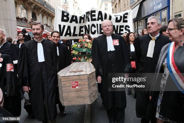 Lawyers take part in a demonstration as part of a nationwide action day by magistrates against a draft law to reform the French justice system in...