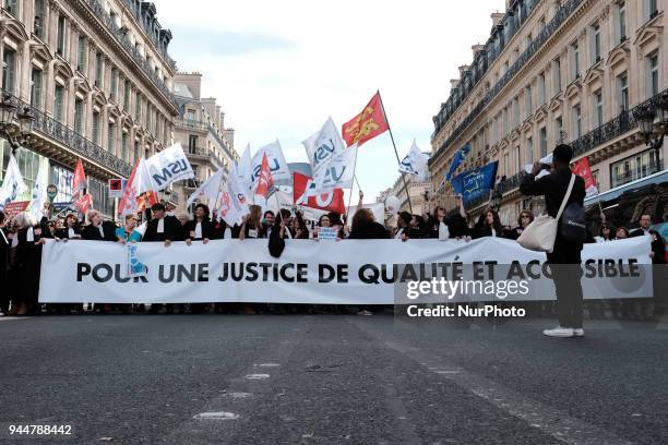 Lawyers take part in a demonstration as part of a nationwide action day by magistrates against a draft law to reform the French justice system in...