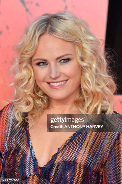 Swedish-Canadian actress Malin Akerman poses on the carpet arriving for the European premiere of the film Rampage in London on April 11, 2018. / AFP...