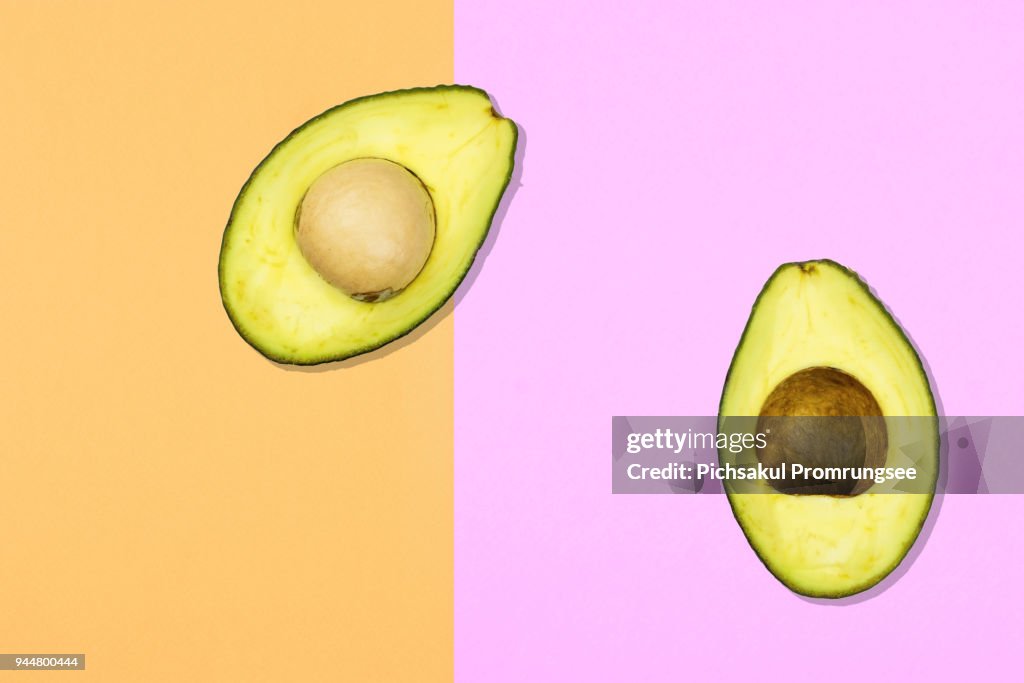 Digitally Generated Image Of Avocado On Colored Background