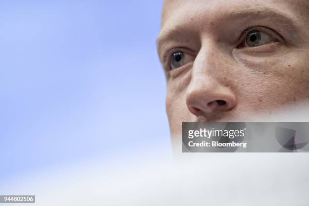 Mark Zuckerberg, chief executive officer and founder of Facebook Inc., listens during a House Energy and Commerce Committee hearing in Washington,...