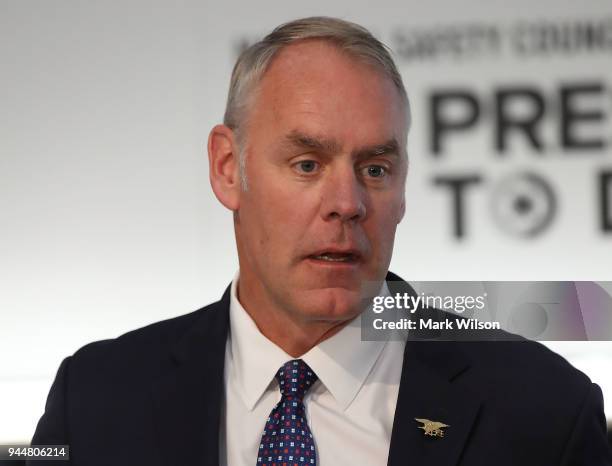 Interior Secretary Ryan Zinke, speaks during the unveiling of "Prescribed to Death" a Memorial to the victims of the opioid crisis, temporally...