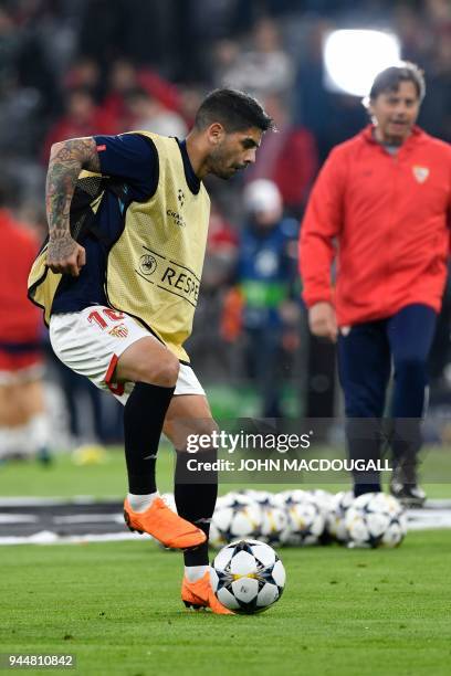 Sevilla's Argentinian midfielder Ever Banega warms up on the ball prior to the UEFA Champions League quarter-final second leg football match between...