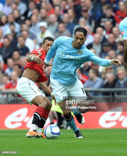 Nani of Manchester United and Joleon Lescott of Manchester City in action during the FA Cup sponsored by E.ON semi final match between Manchester...