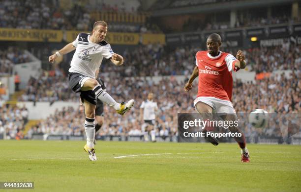 Rafael van der Vaart of Tottenham Hotspur scores a goal past Abou Diaby of Arsenal during the Barclays Premier League match between Tottenham Hotspur...