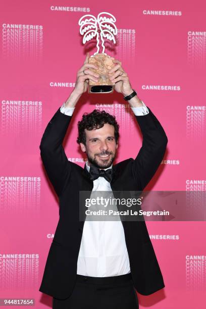 Francesco Montanari poses with the Best Performance award for the serie "Il Cacciatore" at the Canneseries Winners Photocall during the 1st Cannes...