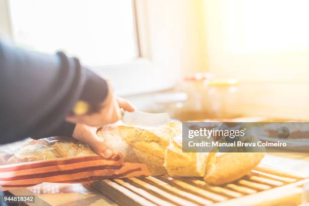 cut the bread - making a sandwich stock pictures, royalty-free photos & images