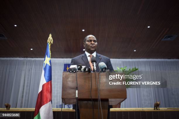 Central African Republic's President Faustin-Archange Touadera gives a news conference following an attack that claimed several lives in PK5,...