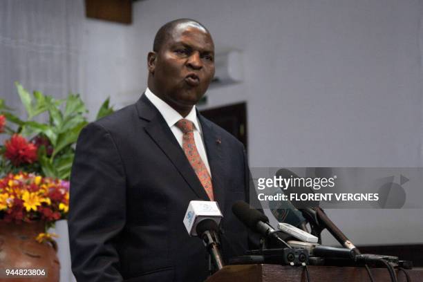 Central African Republic's President Faustin-Archange Touadera gives a news conference following an attack that claimed several lives in PK5,...