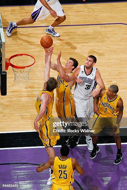 Tyler Hansbrough of the Indiana Pacers goes after the ball during the game against the Sacramento Kings on December 2, 2009 at Arco Arena in...