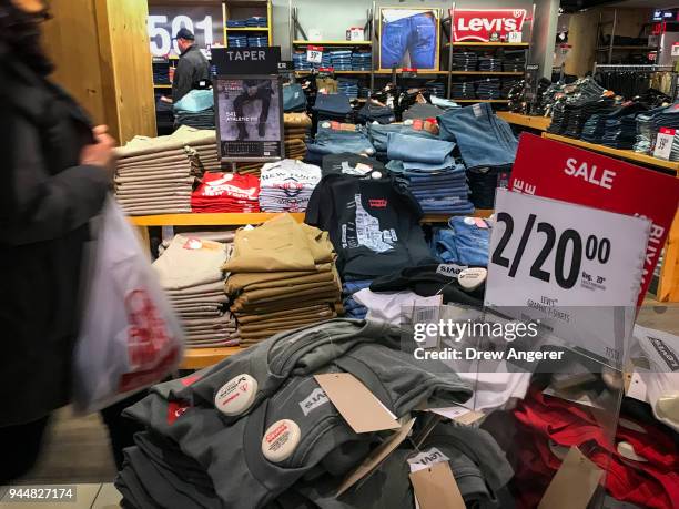 Shoppers browse in a JCPenny store at the Manhattan Mall in the Herald Square neighborhood of Manhattan, April 11, 2018 in New York City. U.S....