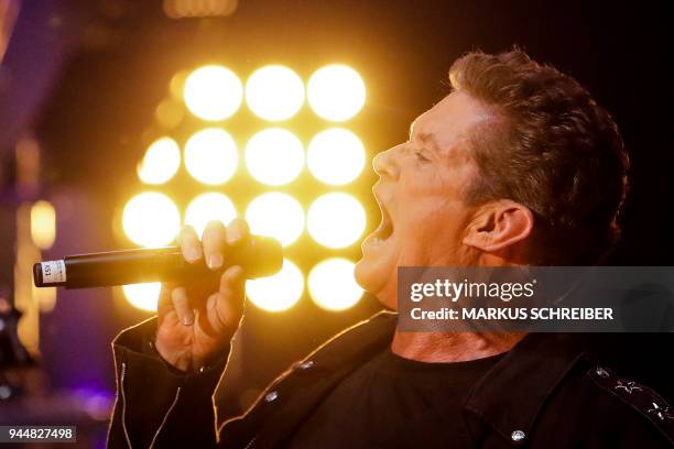 Singer and actor David Haselhoff performs on stage during a concert on April 11, 2018 at the Friedrichstadt-Palast in Berlin. / AFP PHOTO / POOL /...