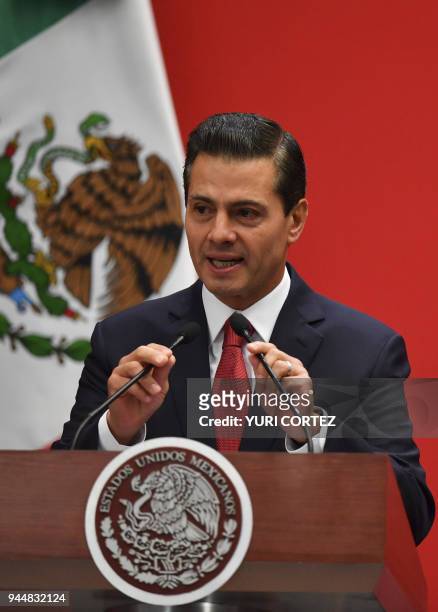 Mexico's President Enrique Pena Nieto delivers a speech during the FIFA World Cup trophy presentation at the Presidential Palace of Los Pinos in...