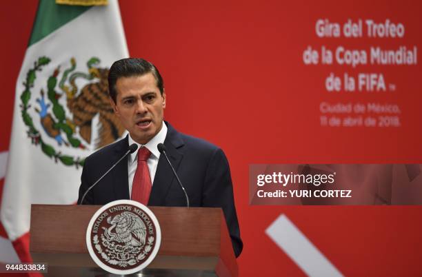 Mexico's President Enrique Pena Nieto delivers a speech during the FIFA World Cup trophy presentation at the Presidential Palace of Los Pinos in...