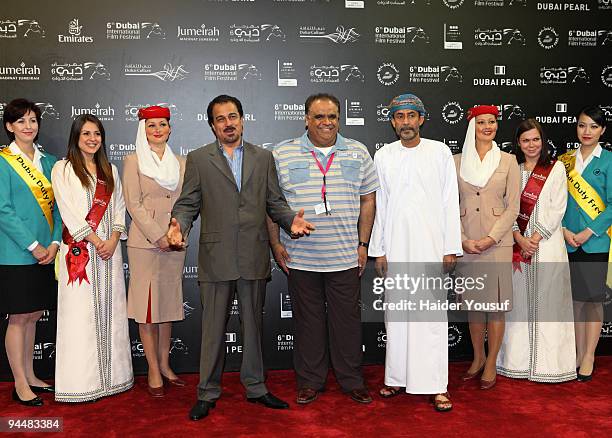 Ibrahim Al Harbi , Dawood Hussein and Saleh Zaal attend the "Avatar" premiere during day seven of the 6th Annual Dubai International Film Festival...