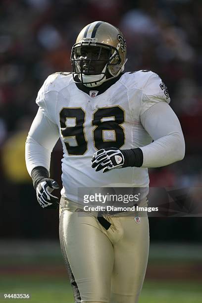 Defensive lineman Sedrick Ellis of the New Orleans Saints jogs up to the line of scrimmage during the first quarter of a game on December 6, 2009...