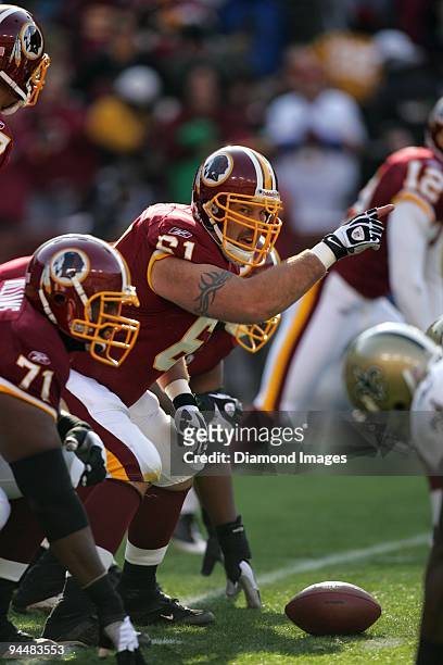 Center Casey Rabach of the Washington Redskins checks the defensive alignment prior to snapping the ball during the first quarter of a game on...