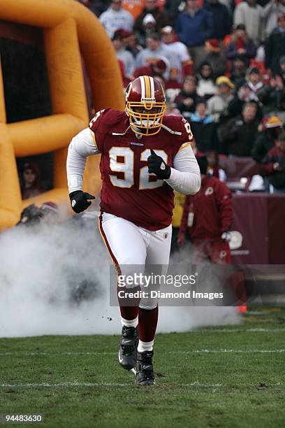 Defensive lineman Albert Haynesworth of the Washington Redskins jogs onto the field prior to a game on December 6, 2009 against the New Orleans...
