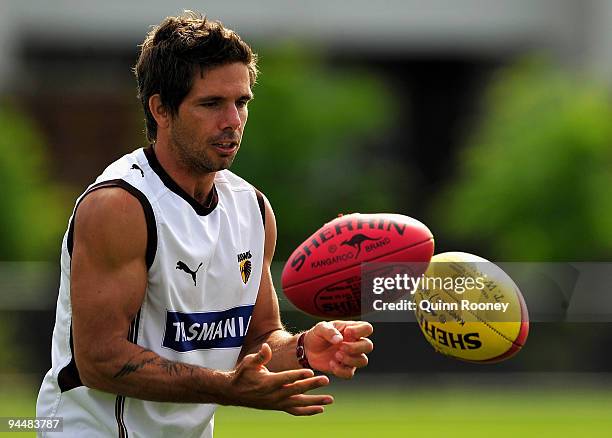 Chance Bateman of the Hawks handballs during a Hawthorn Hawks AFL training session at Waverley Park on December 16, 2009 in Melbourne, Australia.