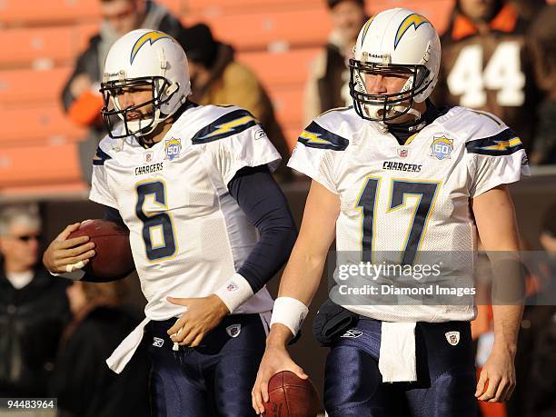 Quarterbacks Charlie Whitehurst and Philip Rivers of the San Diego Chargers warms up prior to a game on December 6, 2009 against the Cleveland Browns...