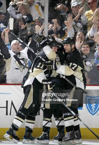 Jordan Staal of the Pittsburgh Penguins celebrates his goal with Mike Rupp against the Philadelphia Flyers on December 15, 2009 at Mellon Arena in...