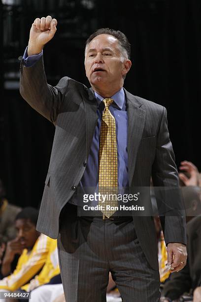 Head coach Jim O'Brien of the Indiana Pacers signals from the sideline during the game against the Portland Trail Blazers at Conseco Fieldhouse on...