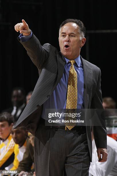 Head coach Jim O'Brien of the Indiana Pacers signals from the sideline during the game against the Portland Trail Blazers at Conseco Fieldhouse on...