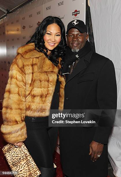 Designer Kimora Lee Simmons and Djimon Hounsou attend the New York premiere of "NINE" at the Ziegfeld Theatre on December 15, 2009 in New York City.