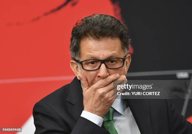 Mexico's national team football coach Colombian Juan Carlos Osorio gestures while attending the FIFA World Cup trophy presentation at the...