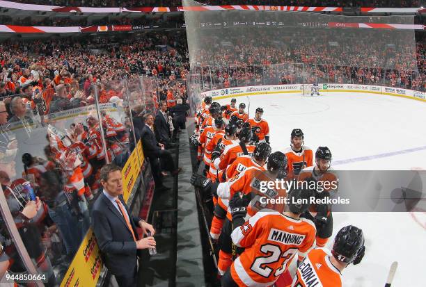 Michael Raffl, Sean Couturier, Ivan Provorov, Claude Giroux and Shayne Gostisbehere of the Philadelphia Flyers celebrate a second period goal with...