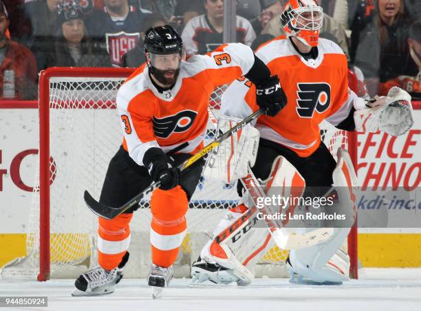 Radko Gudas of the Philadelphia Flyers skates past goaltender Brian Elliott of the New York Rangers on April 7, 2018 at the Wells Fargo Center in...