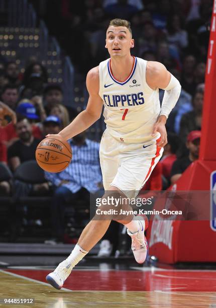 Sam Dekker of the Los Angeles Clippers takes the ball down court in the game against the New Orleans Pelicans at Staples Center on April 9, 2018 in...
