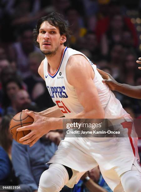 Boban Marjanovic of the Los Angeles Clippers looks to pass the ball during the game against the New Orleans Pelicans at Staples Center on April 9,...