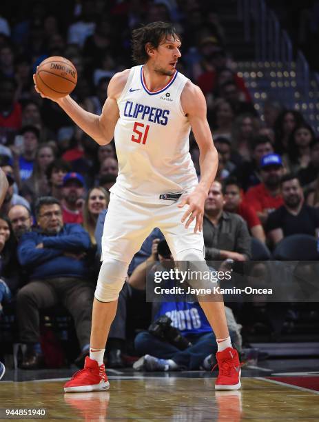 Boban Marjanovic of the Los Angeles Clippers looks to pass the ball during the game against the New Orleans Pelicans at Staples Center on April 9,...
