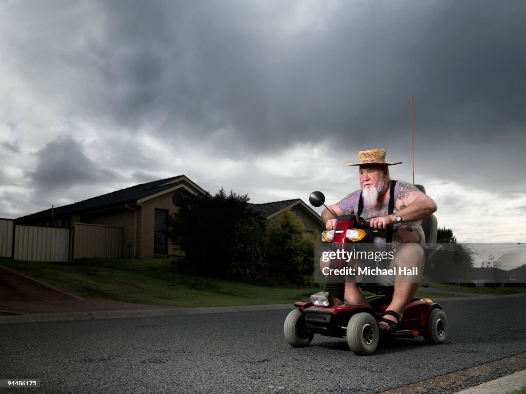 Man on mobility scooter