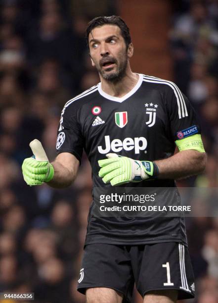 Juventus' Italian goalkeeper Gianluigi Buffon gestures during the UEFA Champions League quarter-final second leg football match between Real Madrid...