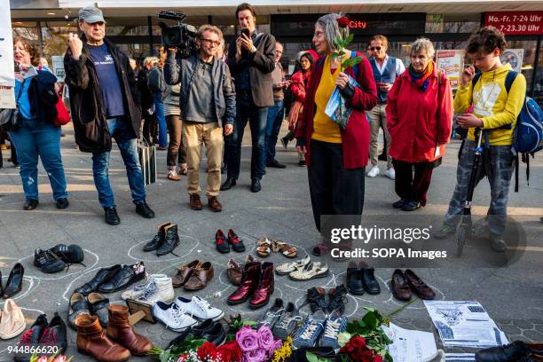 The widow of Rudi Dutschke Gretchen Dutschke-Klotz stands with a rose in front of the memorial stone. Rudi Dutschke was hit by a 23-year-old gunman...