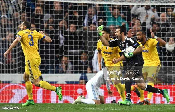 Gianluigi Buffon of Juventus reacts after a penalty is awarded to Real Madrid during the UEFA Champions League Quarter Final Second Leg match between...