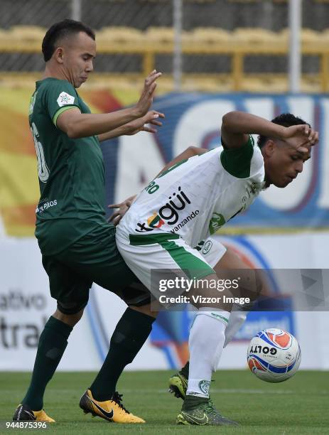 Daniel Padilla of La Equidad fights for the ball with Antony Otero of Leones during a match between La Equidad and Leones FC as part of Liga Aguila I...