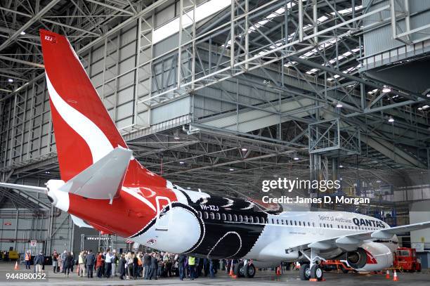 The latest Qantas plane to be painted in aboriginal colours lands at Sydney Airport on November 11, 2013 in Sydney, Australia. The latest aircraft in...