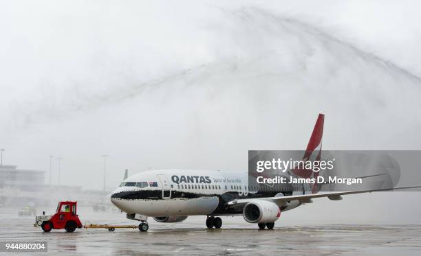 The latest Qantas plane to be painted in aboriginal colours lands at Sydney Airport on November 11, 2013 in Sydney, Australia. The latest aircraft in...