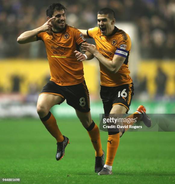 Ruben Neves of Wolverhampton Wanderers celebrates with team mate Conor Coady after scoring a brilliant second half goal during the Sky Bet...