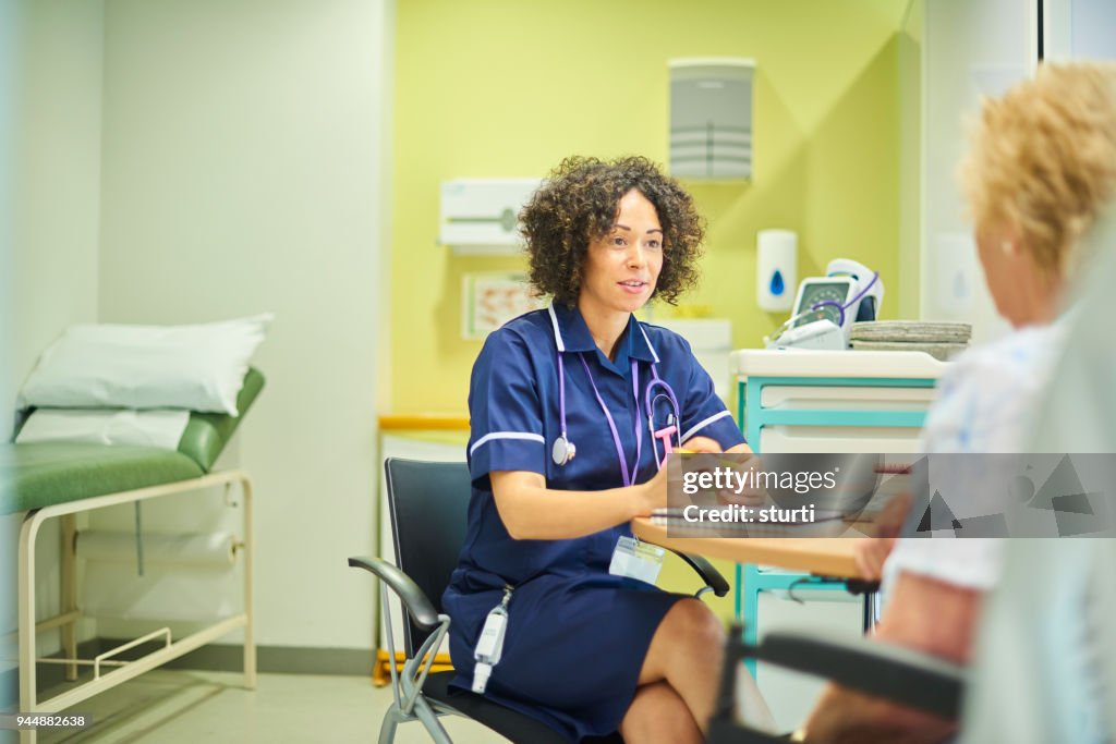 Clinic nurse with patient