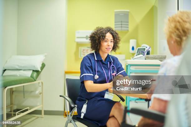 clinic nurse with patient - triage stock pictures, royalty-free photos & images
