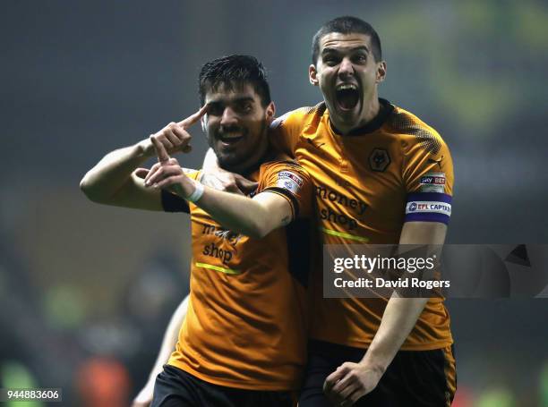 Ruben Neves of Wolverhampton Wanderers celebrates with team mate Conor Coady after scoring a brilliant second half goal during the Sky Bet...