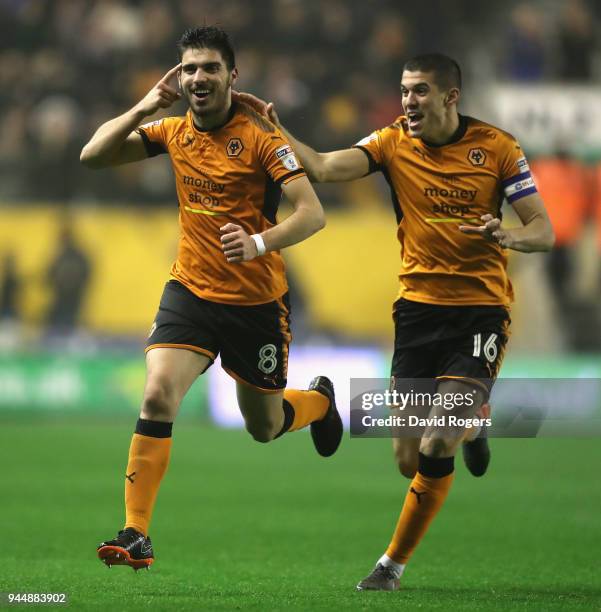 Ruben Neves of Wolverhampton Wanderers celebrates with team mate Conor Coady after scoring a brilliant second half goal during the Sky Bet...